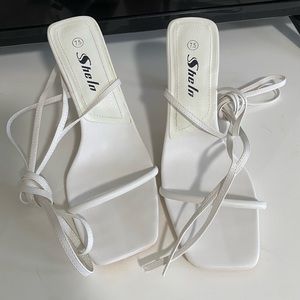 Never worn strappy tie up heels